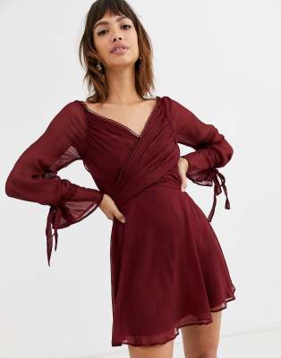 ASOS DESIGN mini dress with layered skirt and wrap waist with lace trim ...