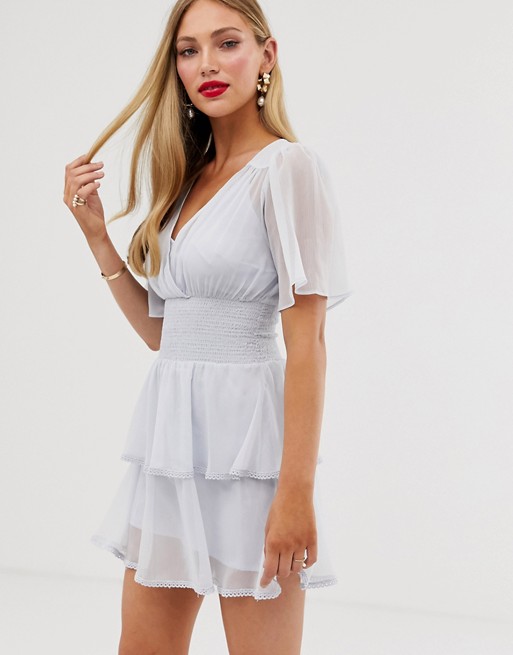 ASOS DESIGN mini dress with smocking detail and double layer skirt