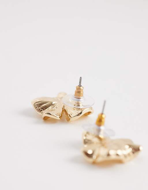 ASOS DESIGN mini flower stud earrings with faux pearl centers in gold tone, 3 of 3