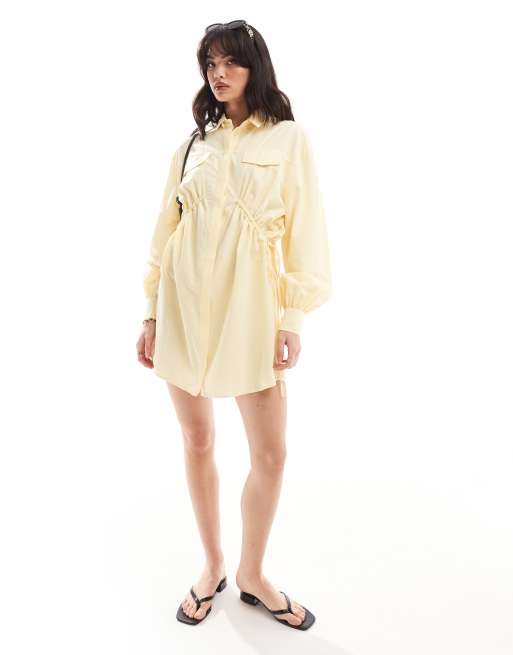 ASOS DESIGN – Mini-Hemdkleid in Buttermilchgelb mit gerafften Seiten und Tasche