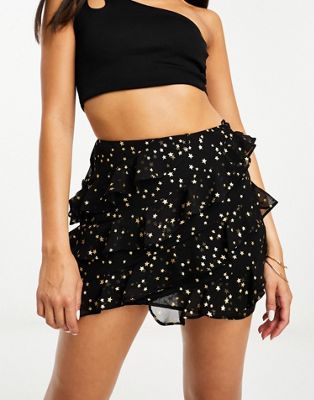 ASOS DESIGN tiered ruffle mini skirt in star print - ASOS Price Checker