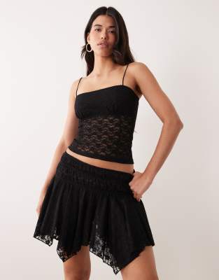 Mini-jupe asymétrique avec superposition en dentelle - Noir 38