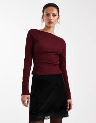 Mini-jupe effet velours avec ourlet en dentelle - Noir 34