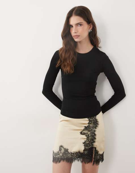 ASOS DESIGN mini-jupe en satin avec empiècement en dentelle, coloris oyster, avec dentelle noire - view 1