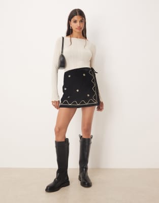 Mini-jupe portefeuille en velours brodé-Noir 46