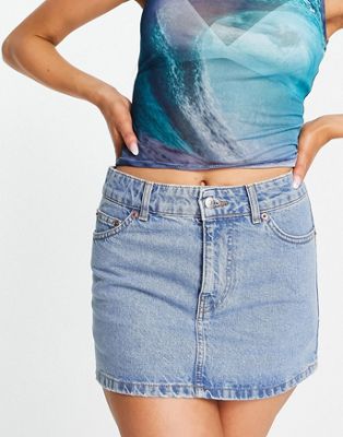ASOS DESIGN - Mini-jupe taille basse en jean - Bleu moyen | ASOS