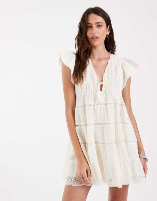 ASOS DESIGN - Mini jurk met gestrikte voorkant en V-hals in ivoorwit, 3 van 4