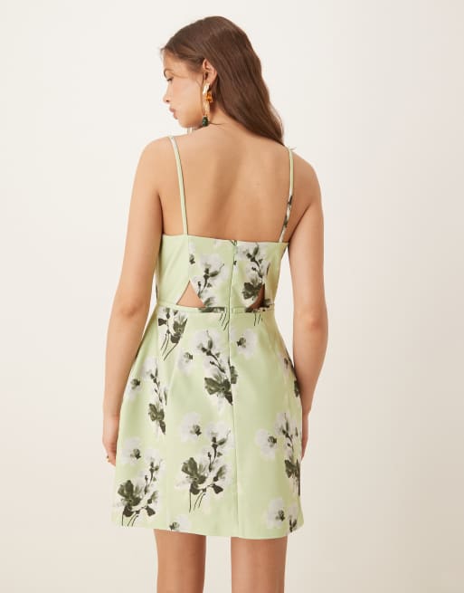 ASOS DESIGN - Mini-jurk met structuur, uitsnijdingen en strik in saliegroen met bloemenprint, 2 van 4