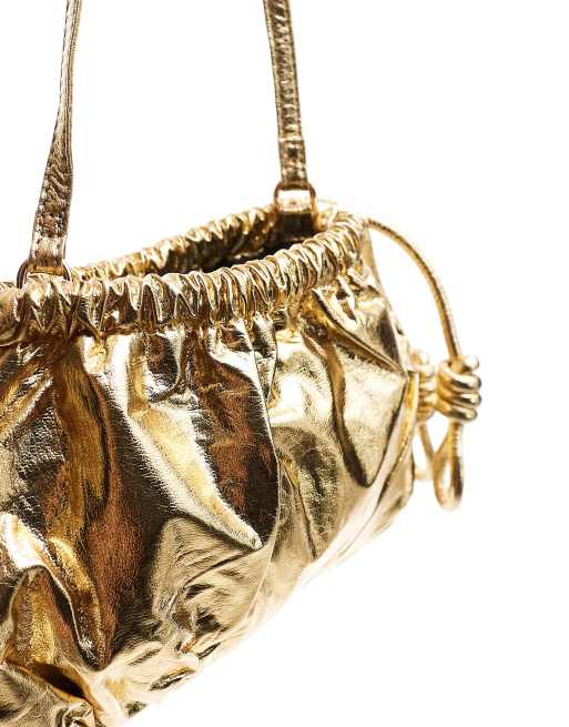 ASOS DESIGN mini metallic drawstring clutch in gold