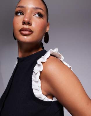 Shop Asos Design Mini Rib Knit Monochrome Button Up Top With Frill Shoulders In Black