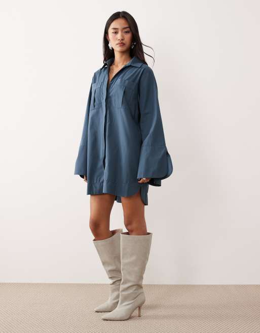 ASOS DESIGN mini shirt dress with wide cuffs and oversized pockets in inky blue