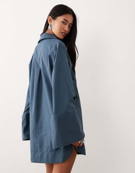 ASOS DESIGN mini shirt dress with wide cuffs and oversized pockets in inky blue