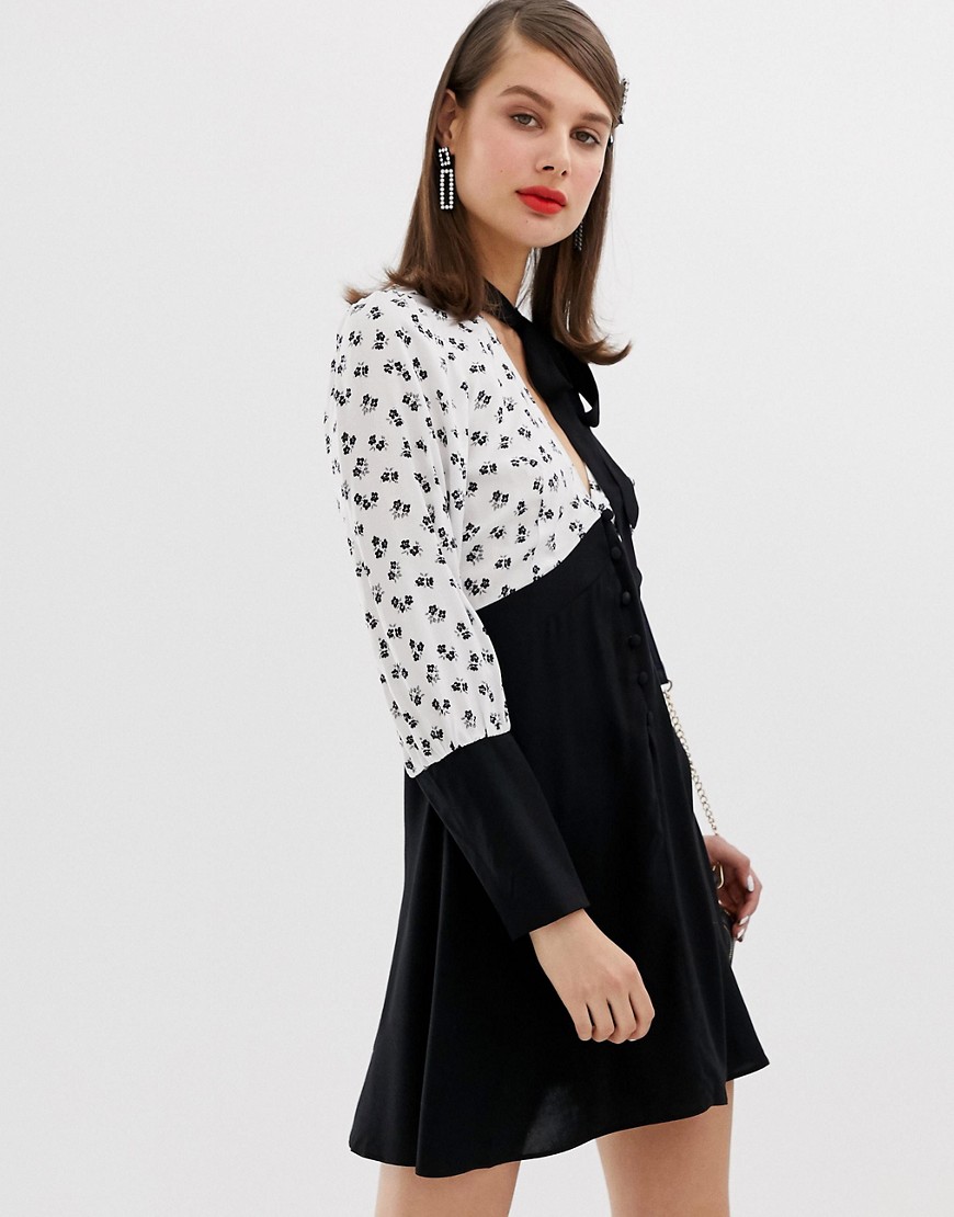 ASOS DESIGN mini skater dress with long sleeves and button detail in ditsy floral print-Multi