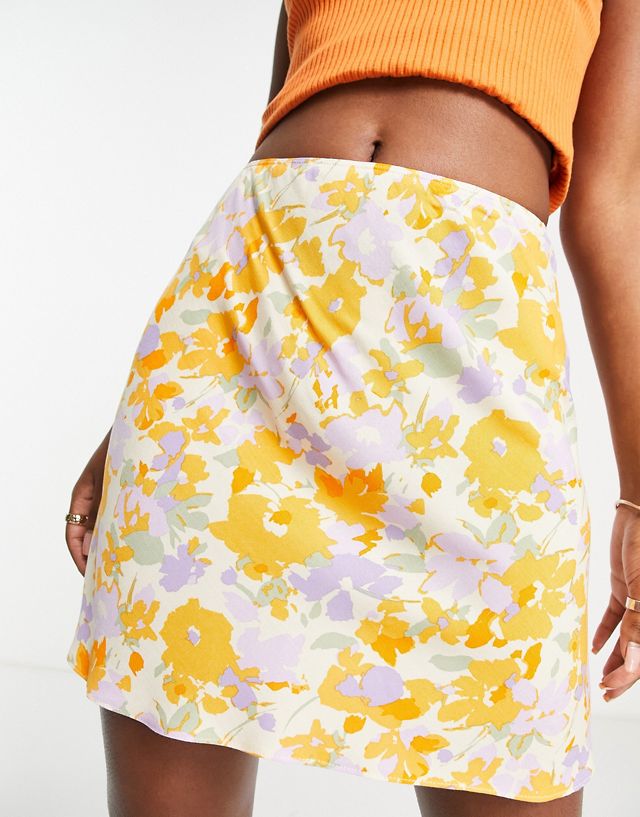 ASOS DESIGN mini slip skirt in bright orange floral print TB9127