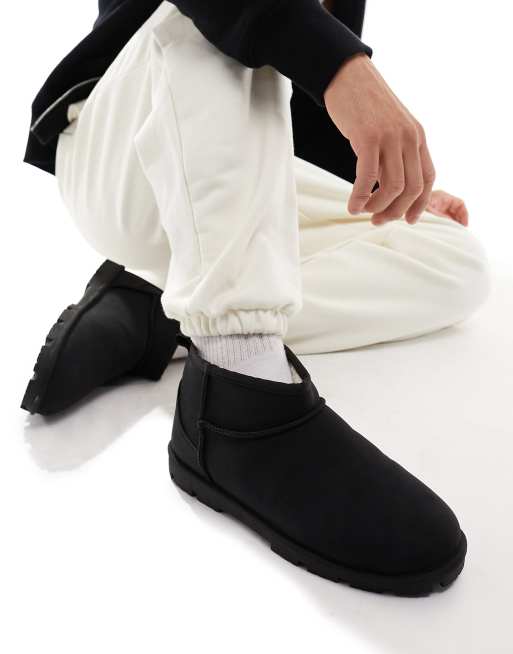 Designer sales slipper boots