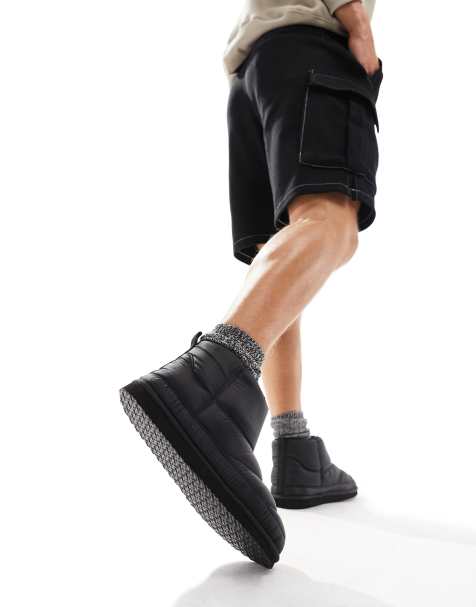 ASOS DESIGN mini slipper puffer boots in black - view 1