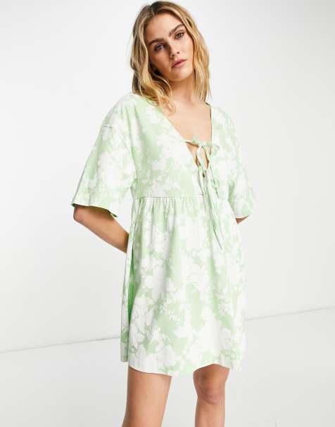 ASOS DESIGN mini smock dress with double tie detail in green and white floral