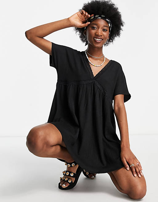  mini smock dress with lace trim and frill sleeve in black 