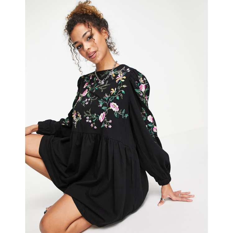 ASOS DESIGN mini smock dress with long sleeves and pink floral embroidery  in black