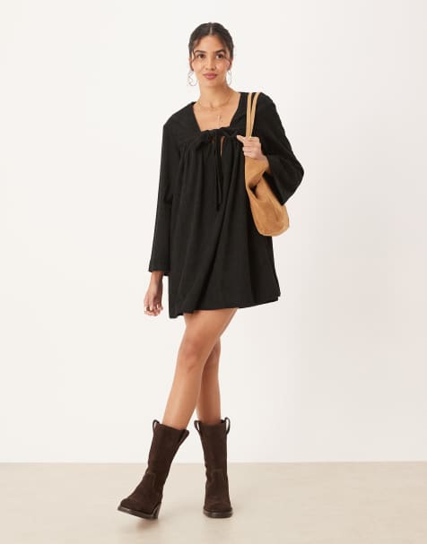 ASOS DESIGN - Mini smockjurk van corduroy met gestrikte voorkant in zwart - view 1