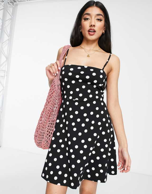 ASOS DESIGN mini strappy sundress with tie back in monochrome spot