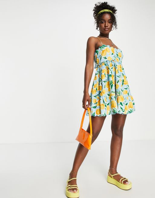 ASOS DESIGN - Mini-sundress med udskæringsdetalje på ryggen og bølgekant i appelsinprint 
