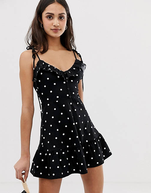 ASOS DESIGN mini sundress with button front and pep hem in polka dot