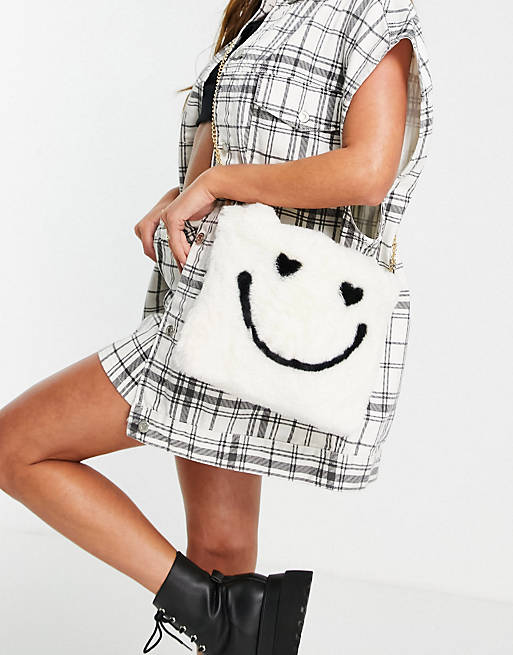 ASOS DESIGN mini tote bag in faux fur happy face print
