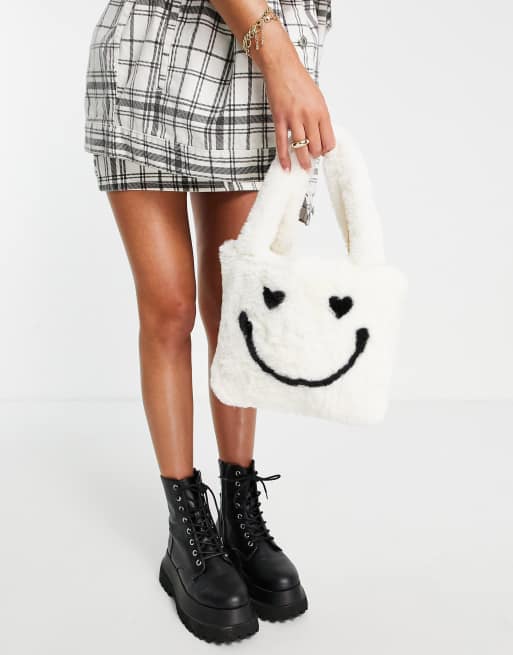 ASOS DESIGN mini faux fur bag with detachable strap