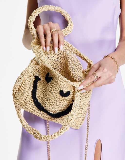 ASOS DESIGN mini tote bag with straw happy face print in natural