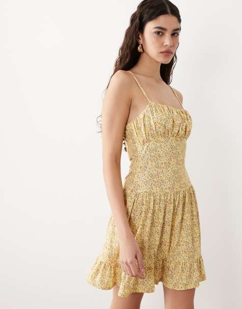 ASOS DESIGN – Mini-Trägerkleid mit gerafftem Rock und Blumenmuster - view 1