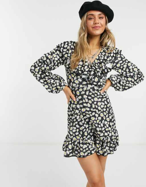ASOS DESIGN mini wrap dress with frill neck and pep hem in black base daisy print