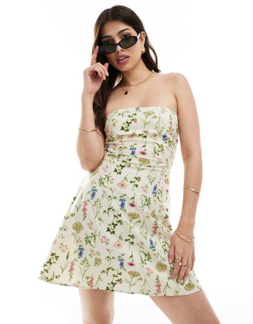 FhyzicsShops DESIGN - Mini zonnejurk met linnenlook en bandeau halslijn en botanische bloemenprint in crème