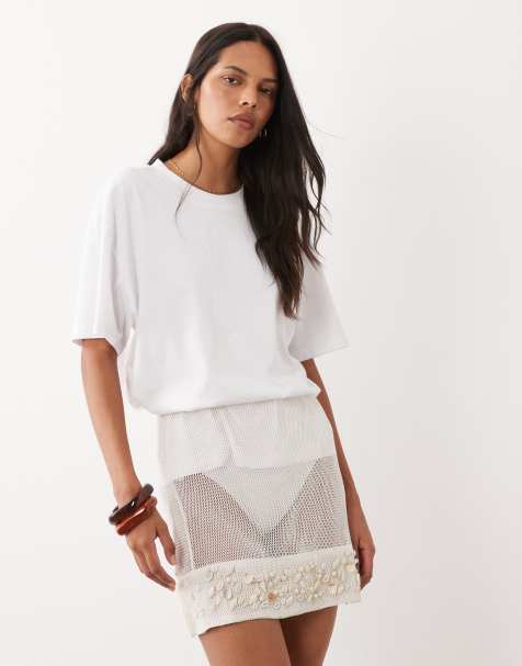 ASOS DESIGN - minifalda de croché transparente con ribete de conchas sintéticas en blanco - view 1