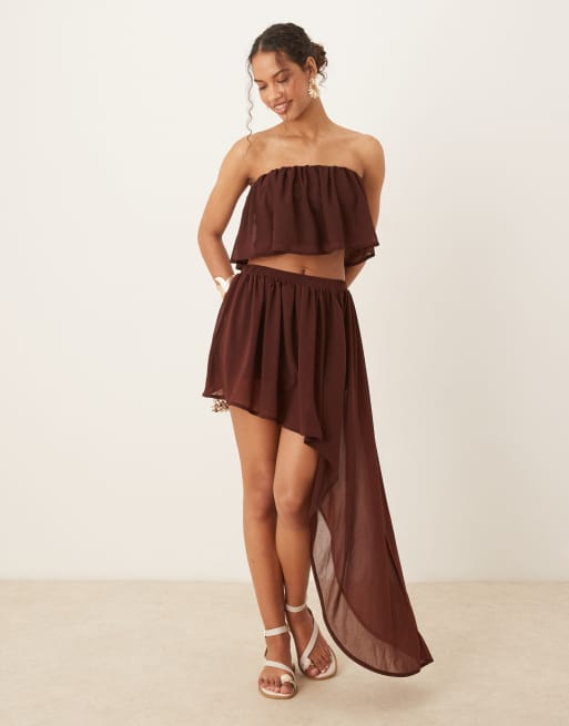 ASOS DESIGN - Minigonna color cioccolato semitrasparente con orlo asimmetrico e volant in coordinato