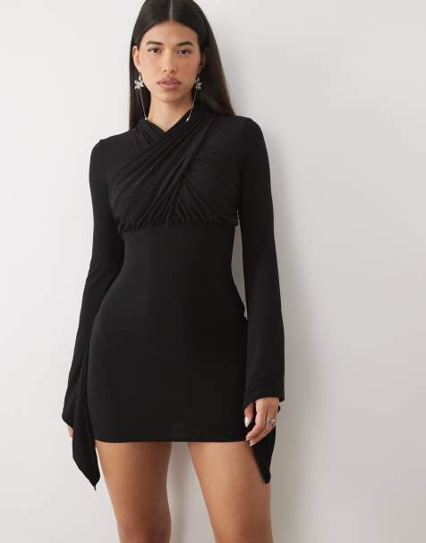 ASOS DESIGN minikjole med overdimensionerede ærmer, høj hals og krydset halsudskæring i sort - view 1