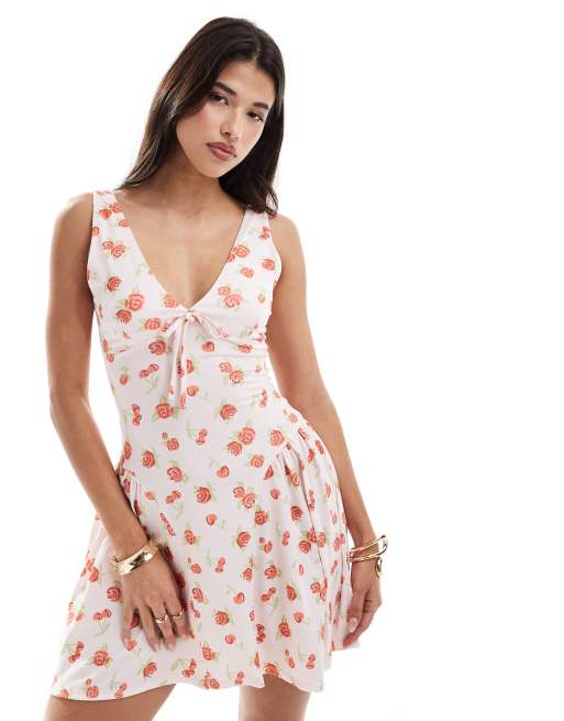 ASOS DESIGN - Minikjole med peplum-kant og bindebånd foran i kirsebær-småprint