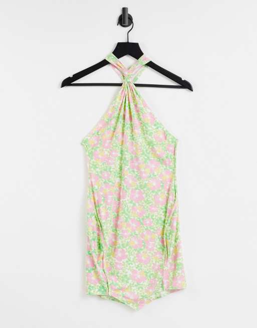 ASOS DESIGN – Miniklänning i blommigt 70-talsmönster med knut och halterneck