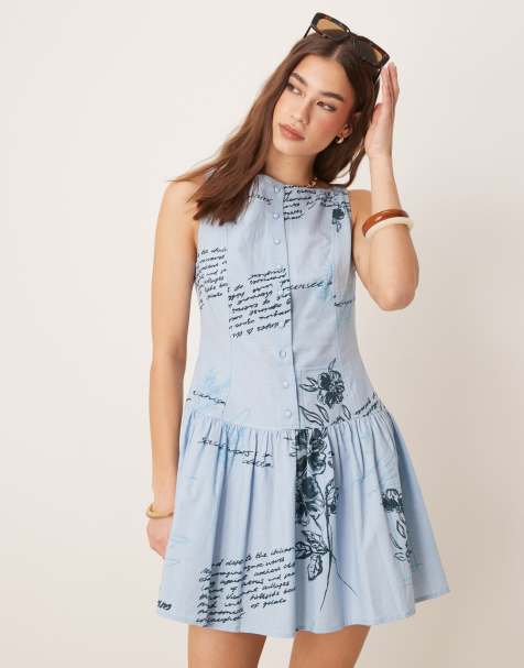 ASOS DESIGN – Minikleid in Blau mit tief angesetzter Taille, U-Boot-Ausschnitt, Blumenmuster und Knopfleiste - view 1