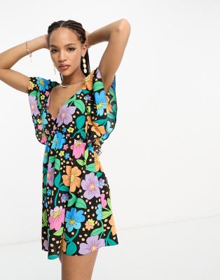 ASOS DESIGN - Minikleid in Schwarz mit Blumen-Punktmuster, Rückenausschnitt und Rüschenärmeln-Bunt