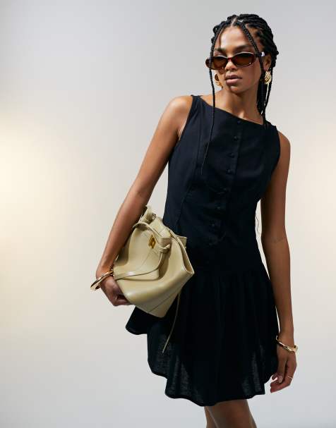 ASOS DESIGN – Minikleid in Schwarz mit tief angesetzter Taille, U-Boot-Ausschnitt und Knopfleiste - view 1
