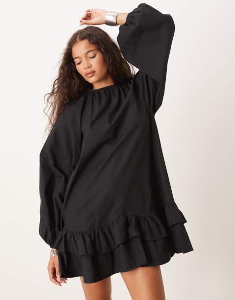ASOS DESIGN – Minikleid in Schwarz mit tiefer Taille, Rüschen und Spitzenbesatz - view 1