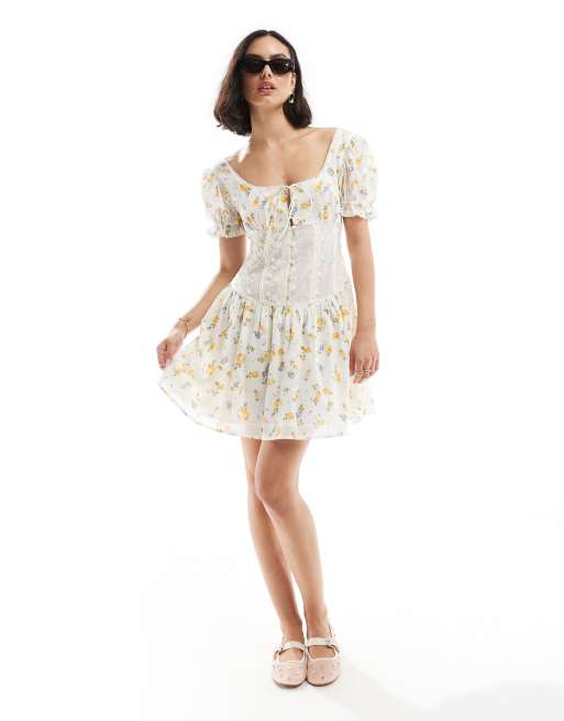 ASOS DESIGN – Minikleid mit Blumenprint in Blau und Zitronengelb, Puffärmeln und Spitze an der Taille