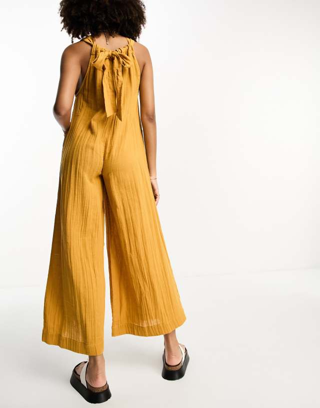 ASOS DESIGN minimal crinkle overalls jumpsuit in mustard