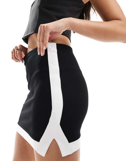 ASOS DESIGN – Minirock in Schwarz mit kontrastierender Einfassung in Weiß