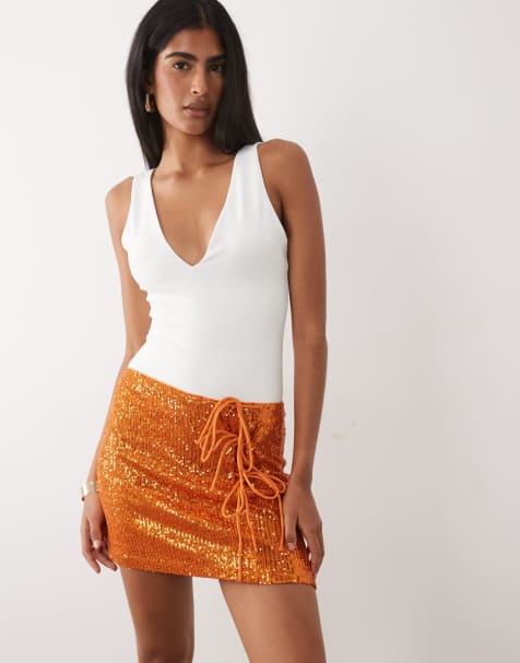 ASOS DESIGN - Minirok met lovertjes en gestrikte zijkant in oranje - view 1