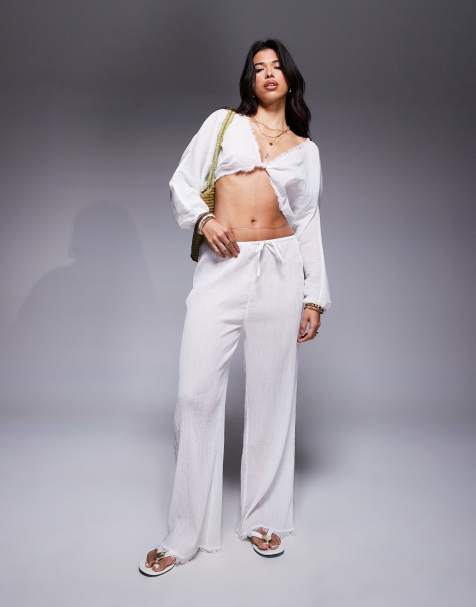 ASOS DESIGN - Mira - Pantaloni da spiaggia bianchi in cotone stropicciato a fondo ampio - view 1