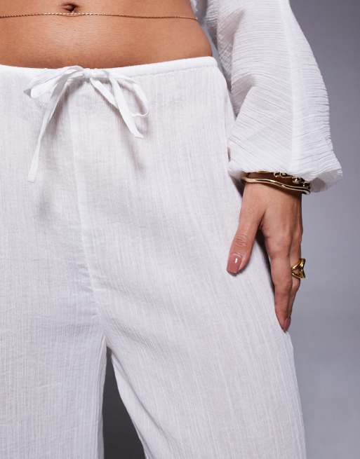 ASOS DESIGN – Mira – Vita, krinklade strandbyxor med vida ben i bomull, 2 av 5