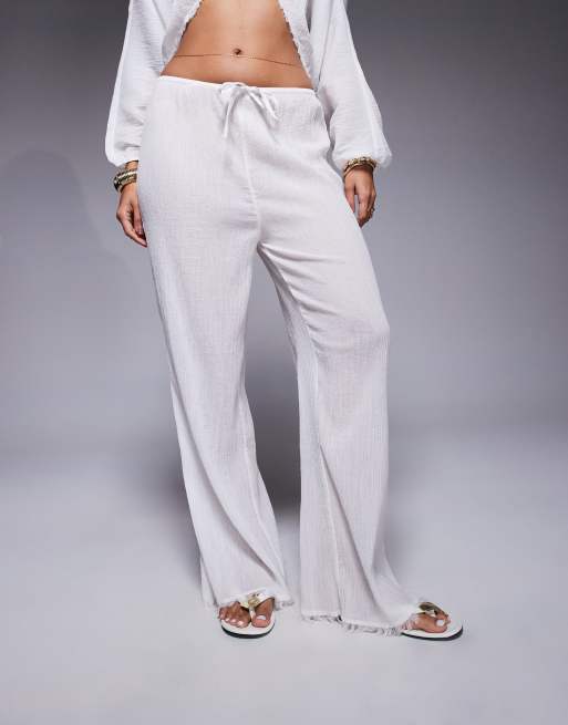 ASOS DESIGN – Mira – Vita, krinklade strandbyxor med vida ben i bomull, 3 av 5