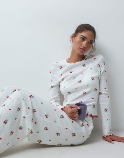 ASOS DESIGN mistletoe print pointelle long sleeve top & wide leg trouser pyjama set in off white - view 1